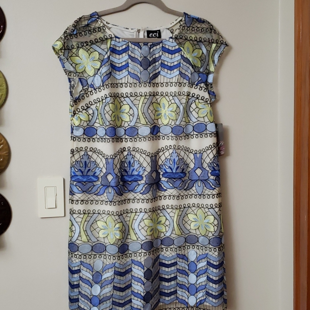 ECI patterned dress with mesh sleeves